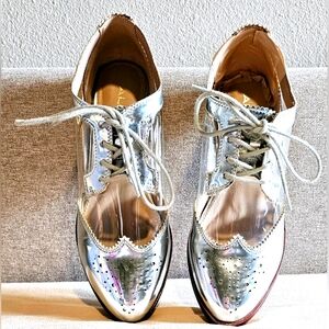 Silver Wingtip Aldo Shoes